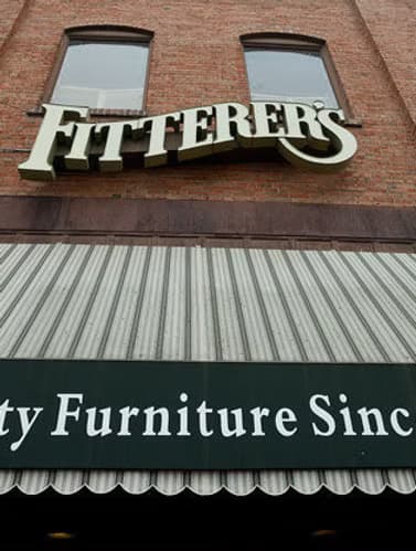 The Fitterer's sign and striped awning on the restored downtown Ellensburg storefront