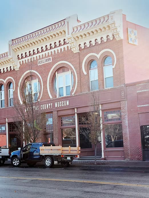 The Kittitas County Historical Museum's ornate brick facade with arched windows and decorative cornice